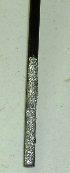 A close up of one tip of a Caden Edge Harrow Tine to really show off the carbide wear surface
