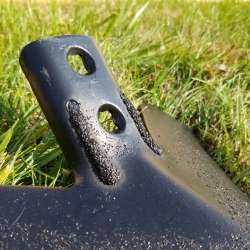 Cade Edge sweep sitting on the grass