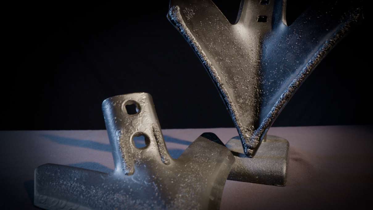 Posed Caden Edge sweeps with a black background to show off the underside and the top of the sweep.